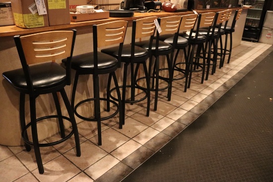 Times 9 - black metal framed swivel bar chairs with black padded seats with