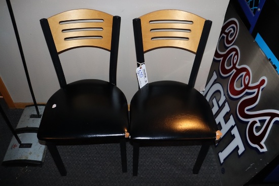 Pair to go - black framed dining chairs with ripped seats