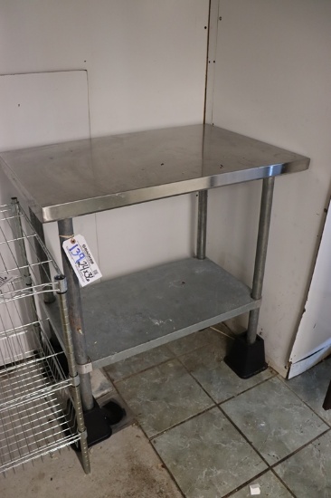 24" x 36" Stainless table with leg risers