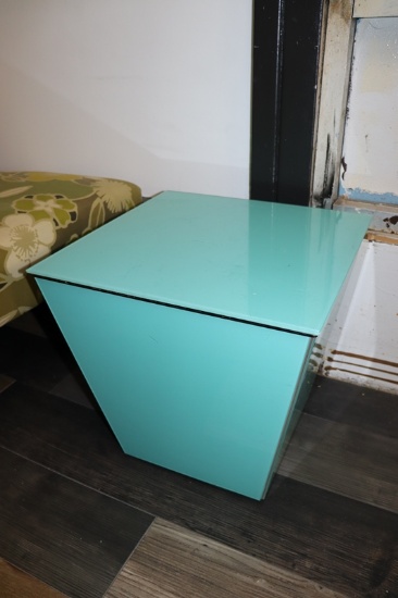 18" x 18" Teal coffee table with glass top & center storage