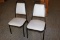 Times 24 - Black metal framed & light gray vinyl stack chairs