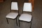 Times 24 - Black metal framed & light gray vinyl stack chairs