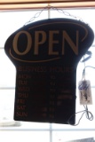 Open sign with business hours