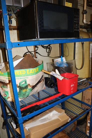 All to go  on rack - microwave, cleaning related and more - as is condition