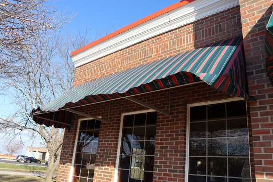 4' x 15' long aluminum framed awning - as is material on awning - buyer to