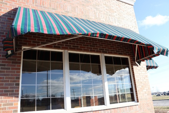 4' x 15' long aluminum framed awning - as is material on awning - buyer to