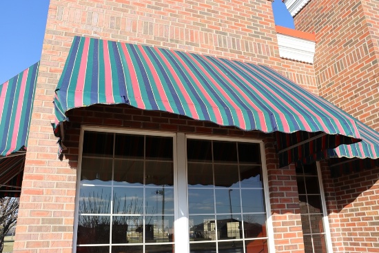 4' x 8' long aluminum framed awning - as is material on awning - buyer to r