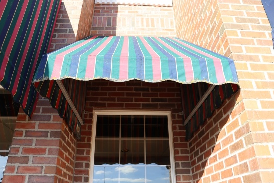 4' x 4' long aluminum framed awning - as is material on awning - buyer to r