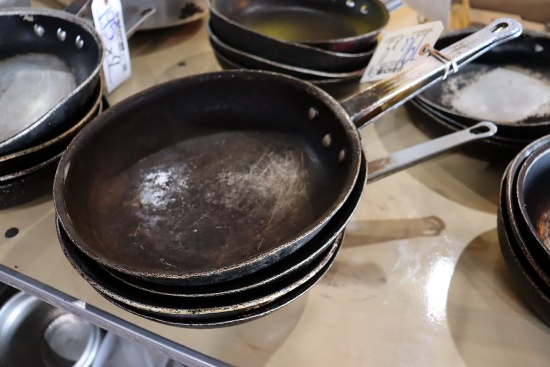 Times 4 - 10" skillets in as is condition