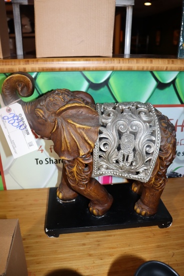 20" x 19" poly resin elephant with base - good condition - the elephant wil