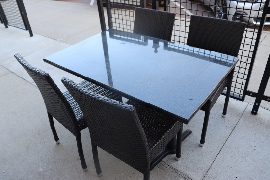 Set to go - 30" x 48" granite top patio table with 4 matching aluminum fram