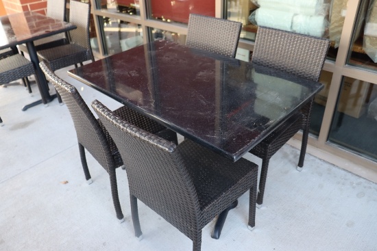 Set to go - 30" x 48" granite top patio table with 4 matching aluminum fram