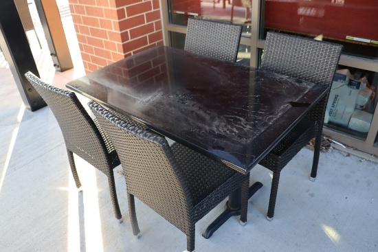 Set to go - 30" x 48" granite top patio table with 4 matching aluminum fram