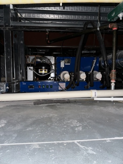 Single large Glycol beer dispensing system.  Has three pumps with gauges