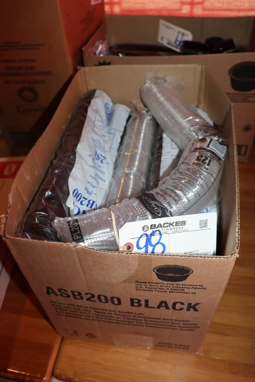 Black 2 oz portion cups with some lids