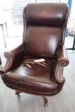 Brown leather executive office chair - showing wear
