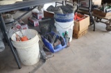 All to go - Boots, buckets, & more under table
