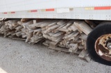 Misc. short dimensional lumber under semi trailer
