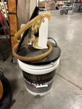 3/4 bucket of Northland 80W90 gear oil with hand pump