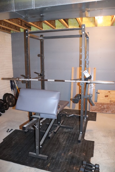 Black metal squat rack with 45# barbell, curl bar, & adjustable bench - loc