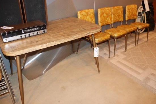30" x 48" wood laminate table with 4 chairs - located in basement