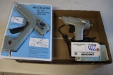 Pair to go - Hot glue guns with glue