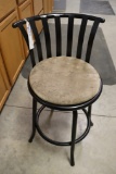 Black framed chair with cloth seat