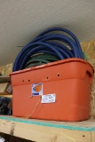 Tote of garden hose - as is