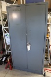 2 door metal cabinet with inventory - paints, cleaners, stains