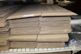 Stack of 16x16x45 flat cardboard boxes