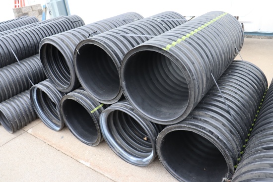Times 7 - sections of 20" round x approximately 4' long PVC tile used in th