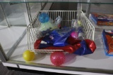 All to go - balls, paddles and redemption prizes in cabinet