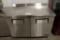 True TWT-48F under counter freezer with stainless work top - has racks - po