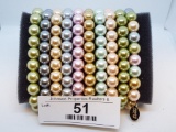 10 Faux Colored Pearl Bracelet Set by Kenneth Jay Comes in original box