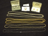 Group with 4 Metallic Necklaces, 2 Pair of Clip on Earrings, and extra bead