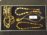 Group of Four Necklaces (Tiger Eye) & 3 Bracelets