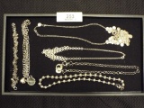 Group of Four Necklaces and Two Bracelets