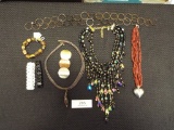 Group of Four Necklaces and Four Bracelets