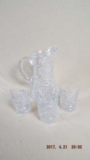 Cut crystal pitcher and 3 rocks glasses