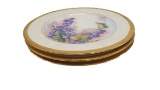 Group of 3 painted plates, gold rimmed signed