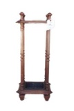 Victorian walnut umbrella stand w/ cast drip plate