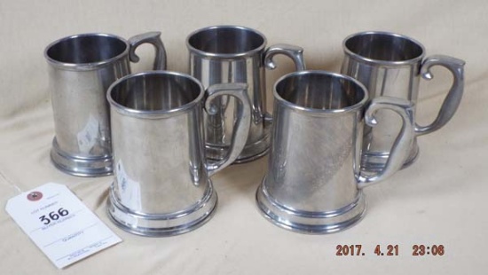 Five pewter tankards with glass bottoms