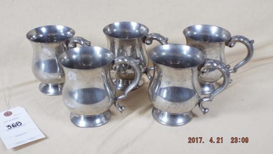 K. Bright five pewter cups