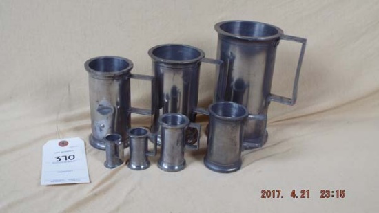 Pewter measuring cups set of 7