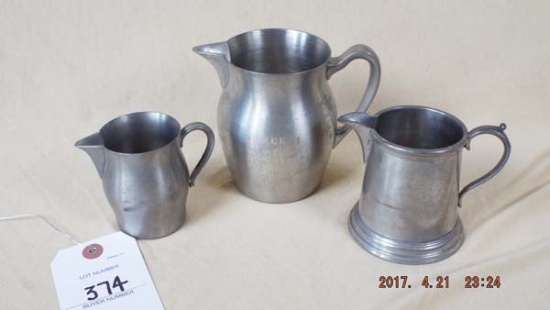 Group of 3 small pewter pitchers