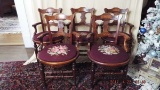 Five Eastlake armed chairs w/ needlepoint seats