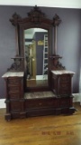 Marble top vanity and mirrored back