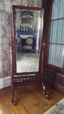 Beveled dressing mirror on walnut stand