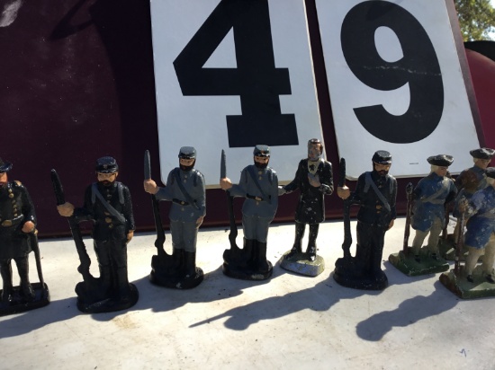 Tin w/ group of metal figurines (Soldiers, Civil War & Colonial - 9 total), approx. 3 1/2" tall