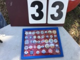 Group of Presidential buttons in a plastic frame; 38 total buttons